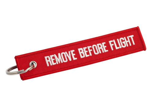 Discussion about “remove before flight” and “CREW” keychains, tags